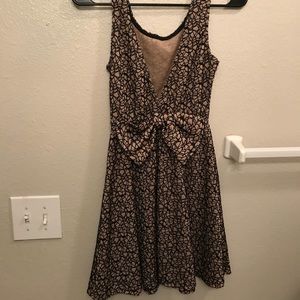 Deep back bow dress fit and flare